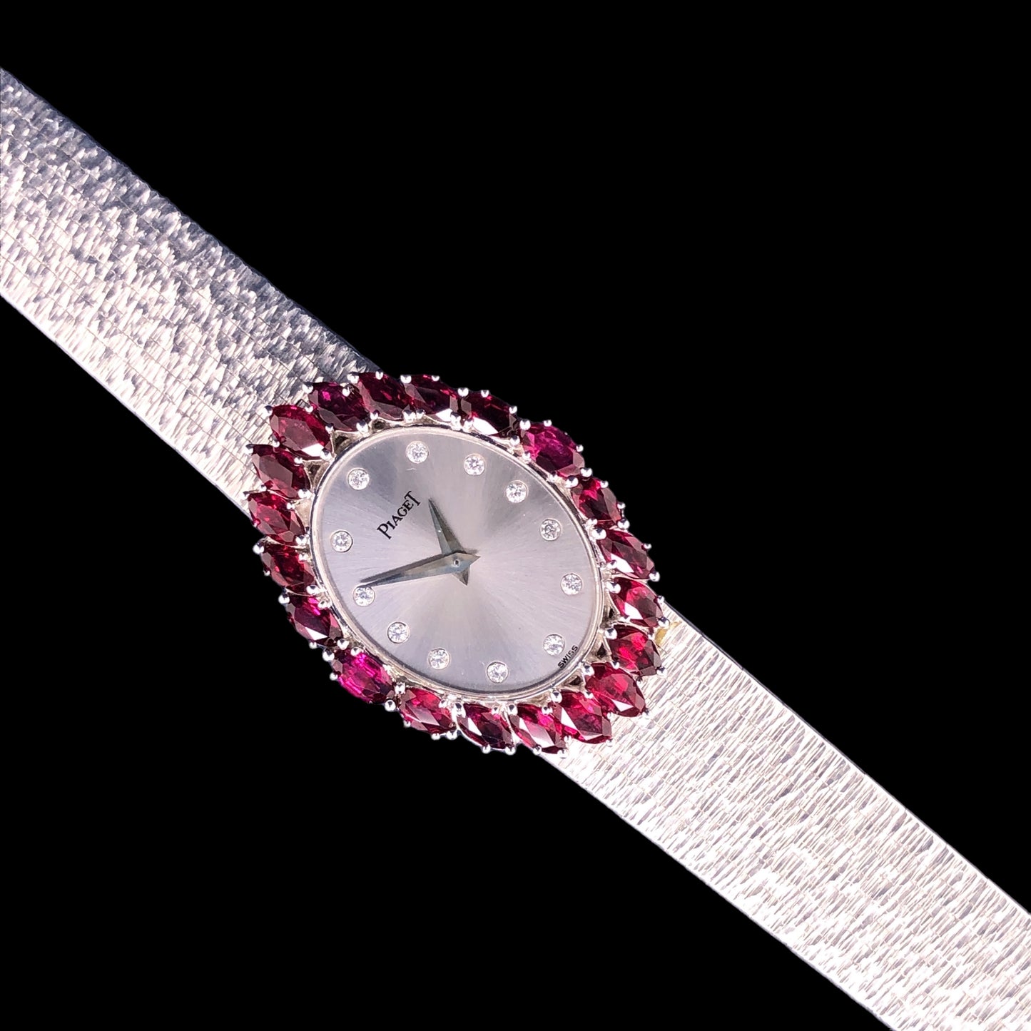 COLLECTIBLE RUBY AND DIAMOND PIAGET WHITE GOLD WATCH